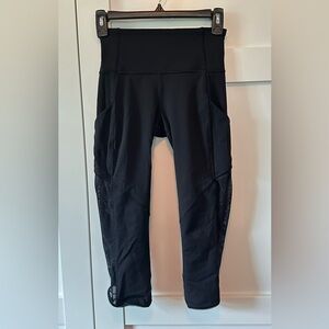 Lululemon black high-rise crop leggings, size 4